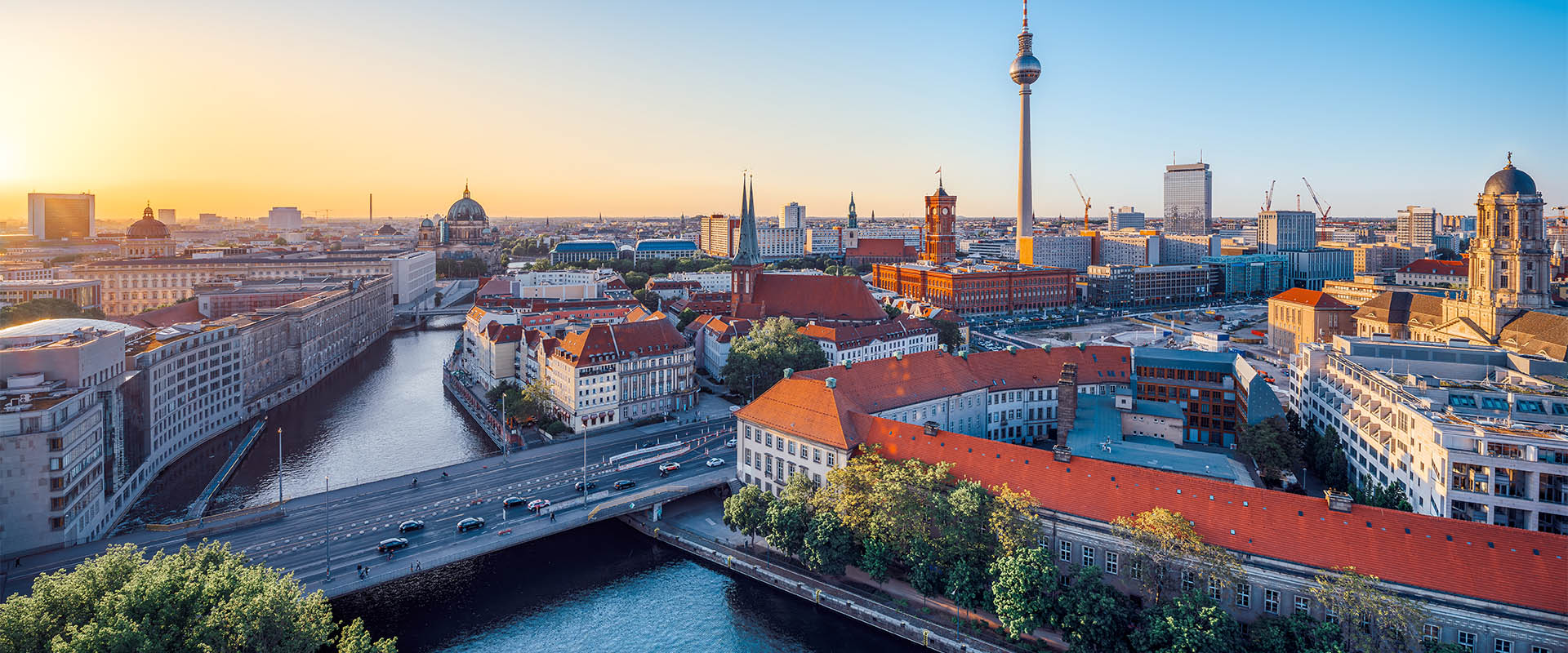 the skyline of berlin during sunset